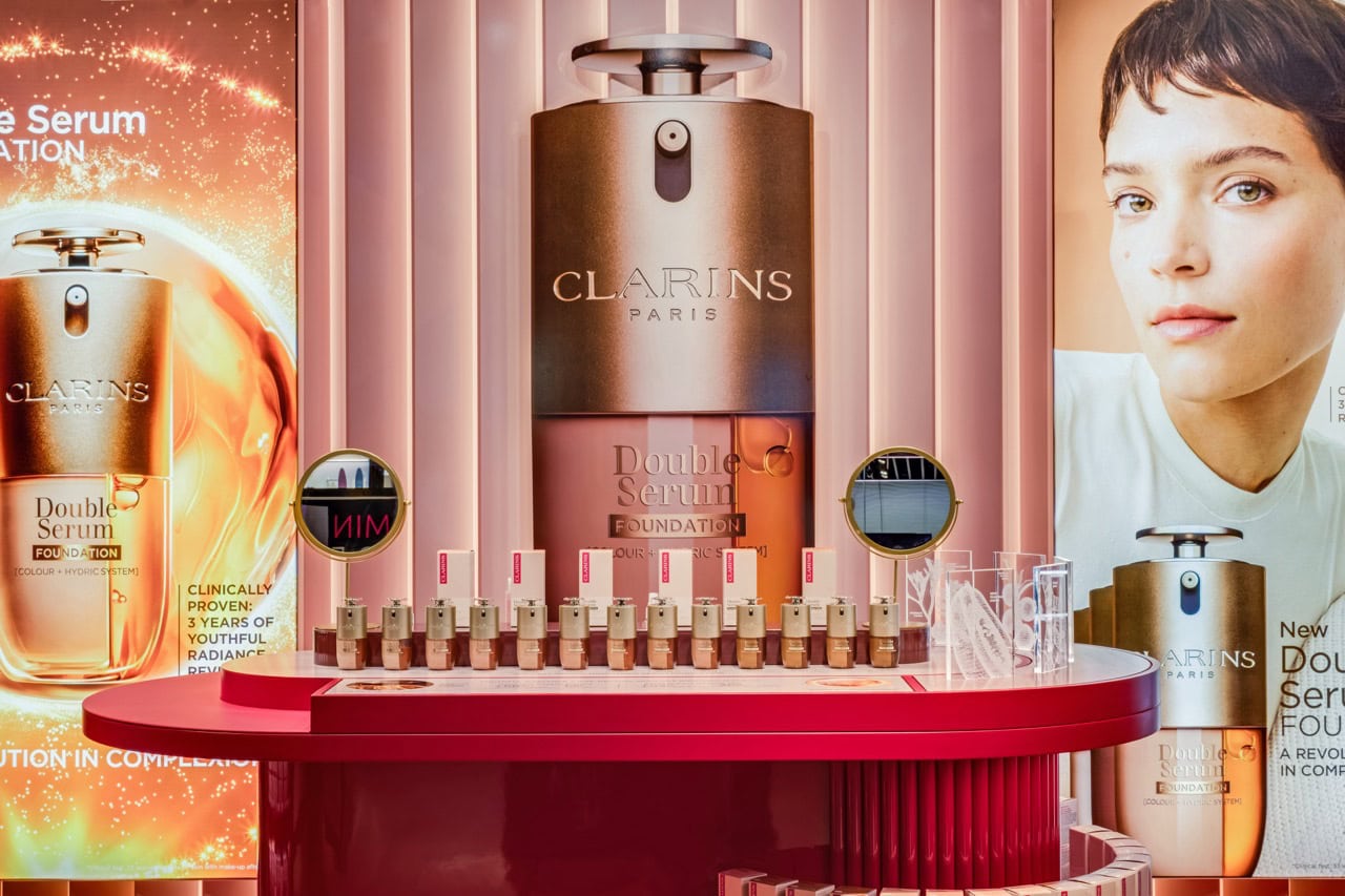Luxury skincare brand promotional display in an airport retail space, Istanbul.