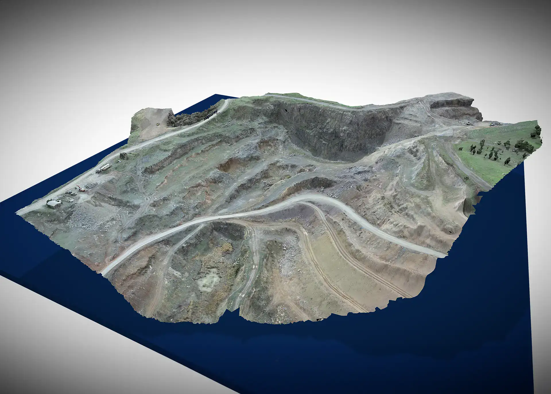 Textured 3D terrain model of a quarry and excavation site, rendered on a white background with a blue base plane showing benched slopes and access ramps.